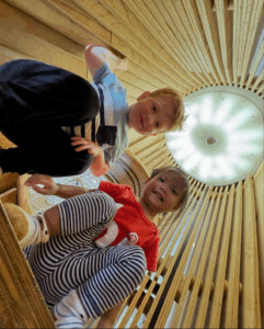 A worm’s eye view of two children playing at the Bay Area Discovery Museum